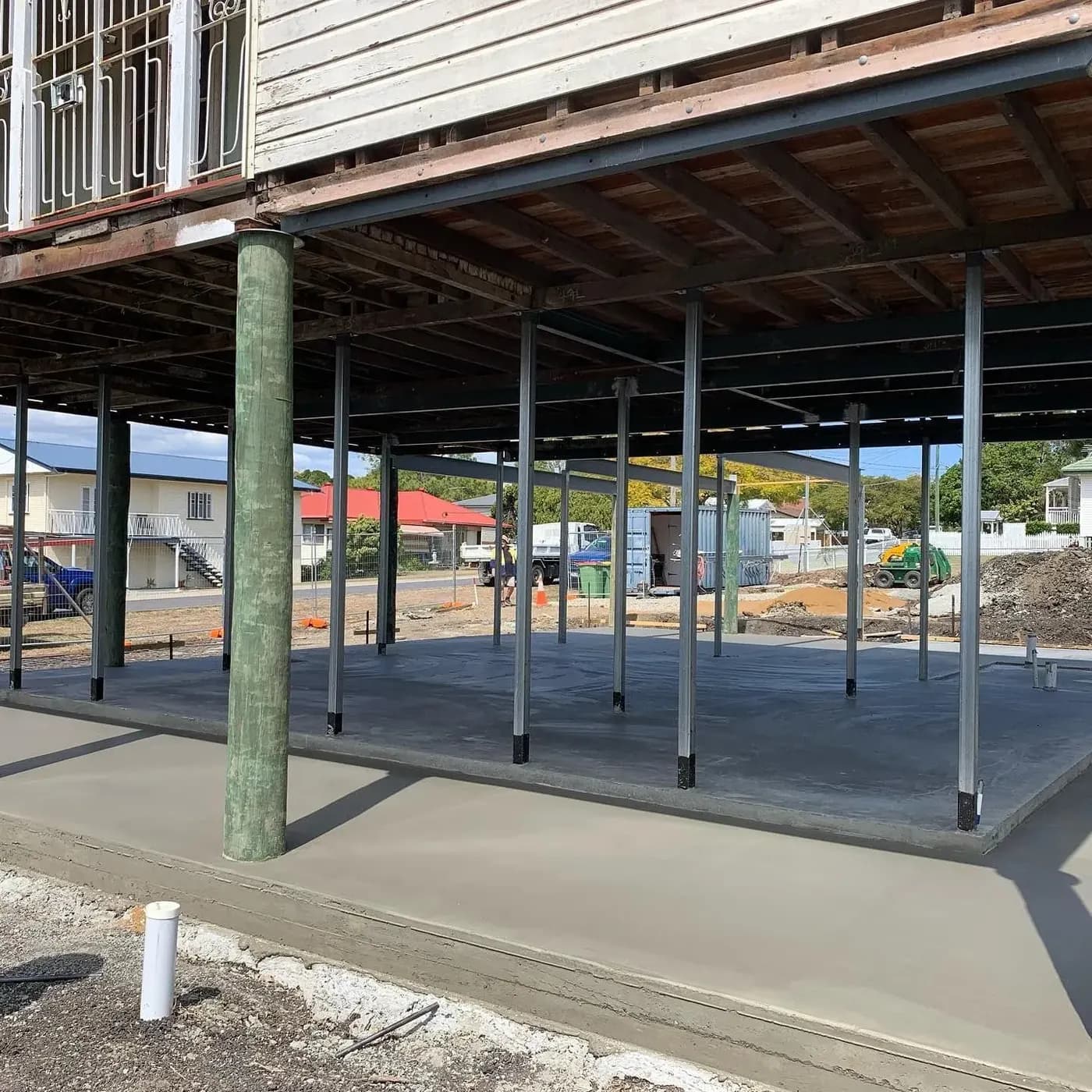 Steel and timber posts bracing a raised house