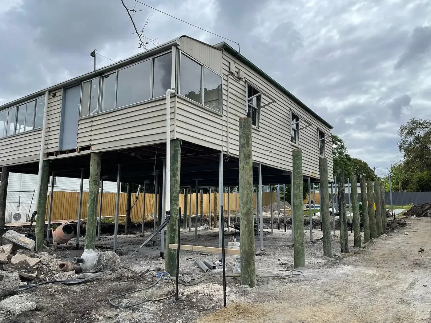 Timber Queenslander sitting on new stumps mid-restump