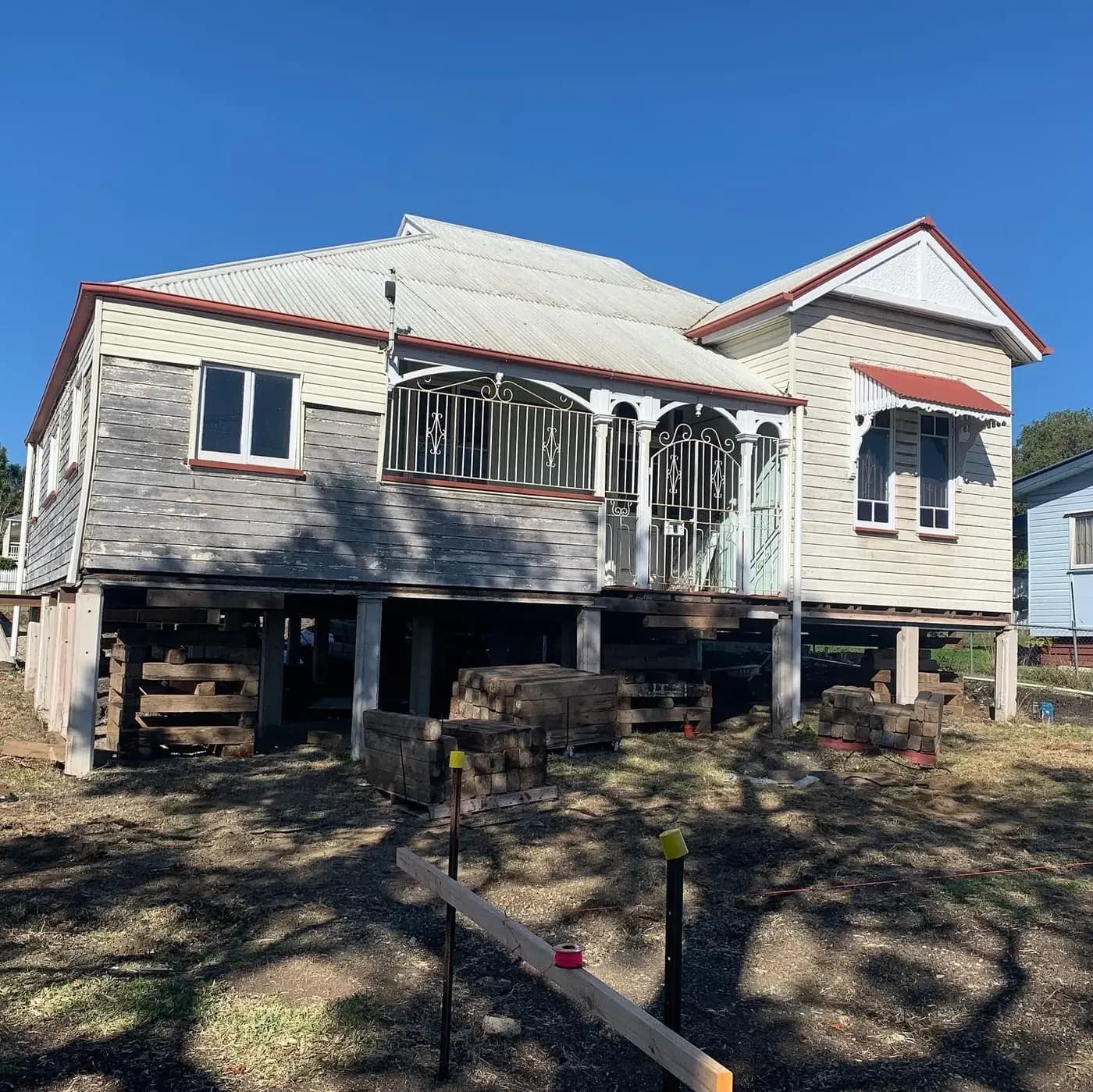 Weatherboard Queenslander raised on new posts